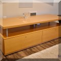 F11. Contemporary maple media console with two drawers. 19.5"h x 60"w x 22"d 